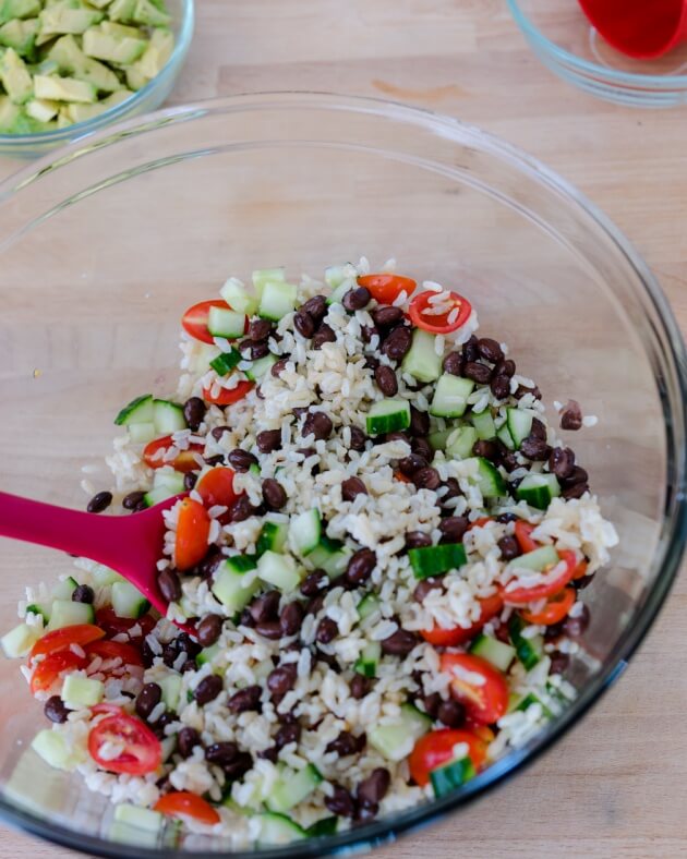 A zesty chili-lime dressing give this black bean & rice salad a great kick. Serve as a side dish as is or over leafy greens.