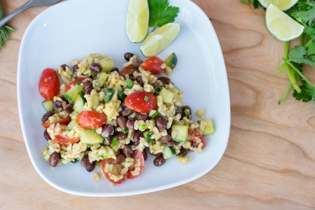 A zesty chili-lime dressing give this black bean & rice salad a great kick. Serve as a side dish as is or over leafy greens.