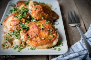 Chicken thighs baked with tomato sauce