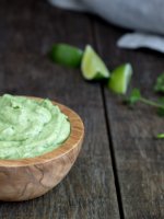 Quick & easy avocado crema has a mild avocado and a tangy lime flavor. A fun alternative to guacamole; avocado crema goes great with tacos.