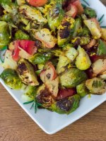 Rosemary roasted Brussels sprouts with apples; seasoned with a mixture of sweet apple, bright citrus, and aromatic rosemary.