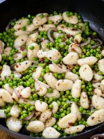 Quick and easy bacon-pea gnocchi is healthy weeknight comfort food the whole family will love. Enjoy as side dish or a meal unto itself.